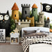 The pirate cat castle mural installed in a colorful boy’s bedroom with wooden furniture.