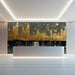 Dining room interior featuring a moody charcoal and gold leaf cityscape wallpaper as a feature wall
