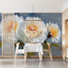 Artistic floral wall mural applied to a home office wall with wooden desk accessories
