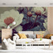 Vintage floral wall mural installed as a sophisticated feature wall in a sunlit bedroom.