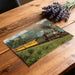 Scenic railway landscape mural as a focal point in a home office with vintage furniture