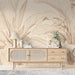 Sun-drenched reading nook with minimal botanical line art wallpaper