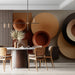Geometric circles mural installed as an accent wall in a modern living room with warm wood furniture.