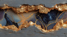 Geode wallpaper pattern featuring cracked charcoal gray stone with shimmering molten gold veins and starry dust.