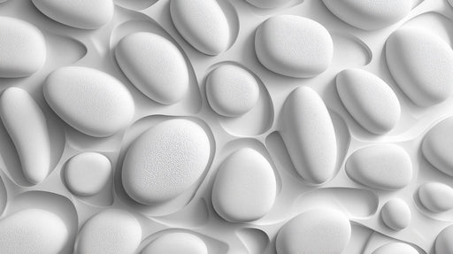 Abstract pattern of smooth 3D white and light gray pebbles creating a sculptural organic texture