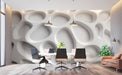 Modern living room featuring a sculptural white wall that adds subtle architectural depth