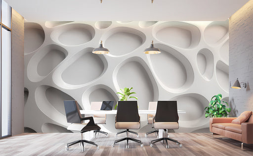 Modern living room featuring a sculptural white wall that adds subtle architectural depth