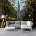 A refined living room design with a European boulevard mural wallpaper backdrop.