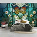 Whimsical butterfly and botanical stained glass wallpaper in a creative home office space