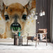 A whimsical reading nook decorated with a fawn mural to provide a gentle, nature-inspired focal point.