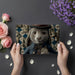 Playful rabbit mural feature wall in a child's bedroom with vintage decor