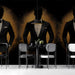An upscale hotel bar lobby featuring a large-scale silhouette wallpaper to provide a luxury atmosphere.