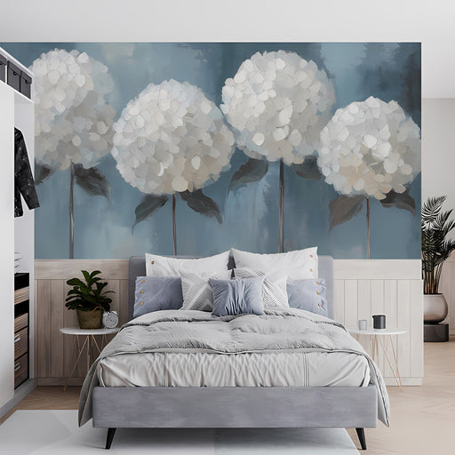 Floral hydrangea mural installed in a sophisticated blue-toned master bedroom.