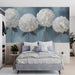 Floral hydrangea mural installed in a sophisticated blue-toned master bedroom.