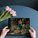 The garden mural installed in a sophisticated home office with brass light fixtures.
