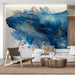 A calm home office space with the blue whale mural accent wall providing a creative focal point.