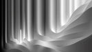 Abstract wallpaper pattern with flowing vertical white and charcoal gray waves.