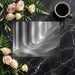 A sleek home office featuring the gray and white abstract wave mural design.