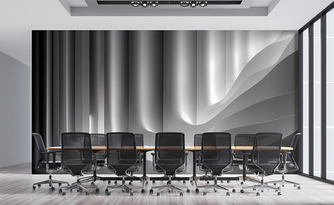 A sophisticated living room with modern monochrome wave wallpaper as a feature wall.