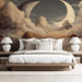 A cozy library reading nook featuring celestial moon wallpaper above a velvet armchair and dark wood bookshelves.