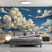 Vintage-style sky mural used as a backdrop in a modern bedroom above a wooden bed frame