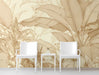 A minimalist bedroom featuring banana leaf mural wallpaper for a warm and calming retreat.