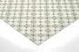 Bright kitchen featuring sage and cream geometric patterned wallpaper