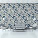 Formal entryway hallway featuring classic indigo and oatmeal scroll pattern wallpaper