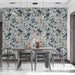 Traditional dining room featuring classic indigo floral wallpaper and mahogany furniture