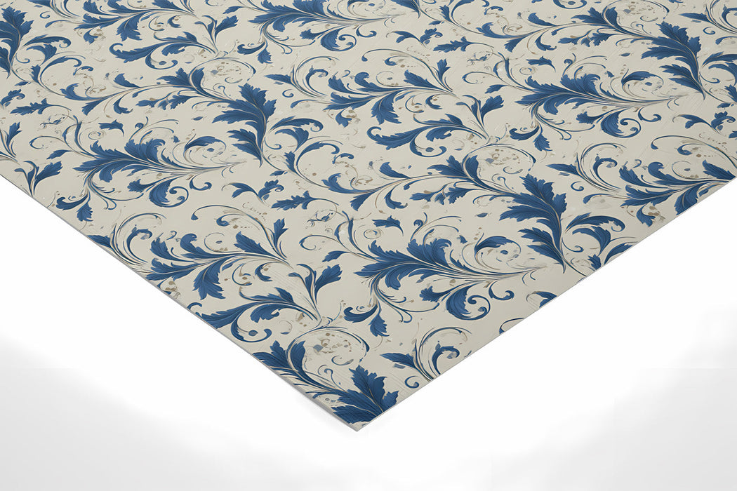 A bright, traditional home office space styled with the elegant blue leaf pattern mural.