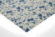 A bright, traditional home office space styled with the elegant blue leaf pattern mural.