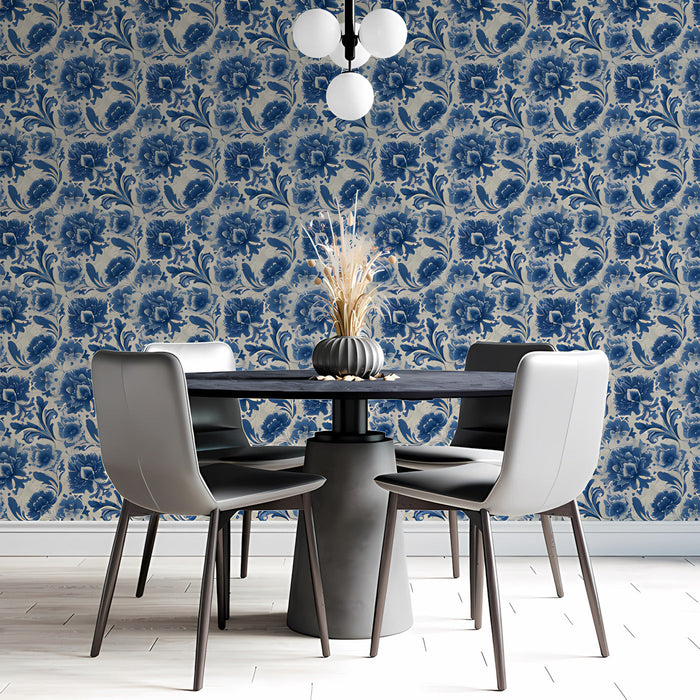 A sophisticated dining room with blue floral damask wallpaper and a long wooden table.