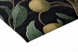 Cozy home library with dark citrus orchard wallpaper and leather armchairs