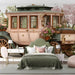 Floral carriage wallpaper installed as a whimsical feature wall in a nursery