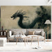 A quiet reading room with an armchair placed against the charcoal and mist dragon wall mural.