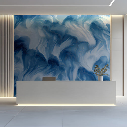 Living room interior featuring an abstract blue fluid art mural wallpaper behind a light gray sofa.