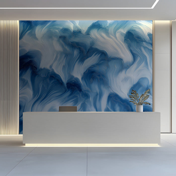 Living room interior featuring an abstract blue fluid art mural wallpaper behind a light gray sofa.