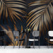 Gilded palm leaf wallpaper installed as an elegant accent wall in a modern dining room