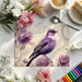 A nursery wall decorated with soft lavender songbird wallpaper and light wooden crib