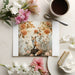 Forest-themed rose mural on the wall of a bright, airy living room with soft textiles