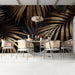 Dark botanical accent wall featuring gold palm leaves in a luxurious bedroom
