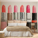 A creative home office space featuring a pop-art style lipstick wallpaper to provide a burst of personality.