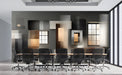 Modern office space with charcoal and amber geometric mural creating a professional backdrop