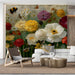 Botanical art wallpaper as a feature wall in a sunlit bedroom with brass accents