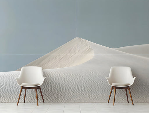 Modern living room wall featuring a large-scale sand dune landscape mural with minimalist furniture