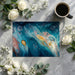 Creative home office space with a colorful abstract fluid mural wallpaper, styled with minimalist furniture
