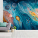 Contemporary dining room with a vibrant, artistic fluid motion mural on the main wall, paired with light wood decor