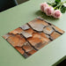 Home office interior with earthy bark-textured mural wallpaper and dark wood furniture
