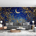 A cozy reading nook featuring an illuminated midnight blue mural with gold botanical accents and soft warm lighting.