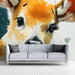 Fawn mural installed as a playful and soft feature wall in a nursery